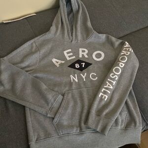 A Gray Hoodie with NYC on front